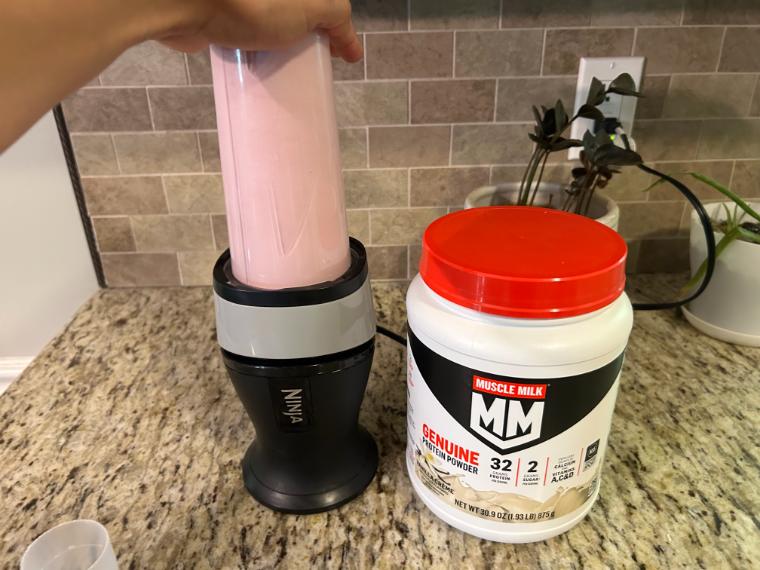 Our tester blending up a serving Muscle Milk Genuine Protein Powder.