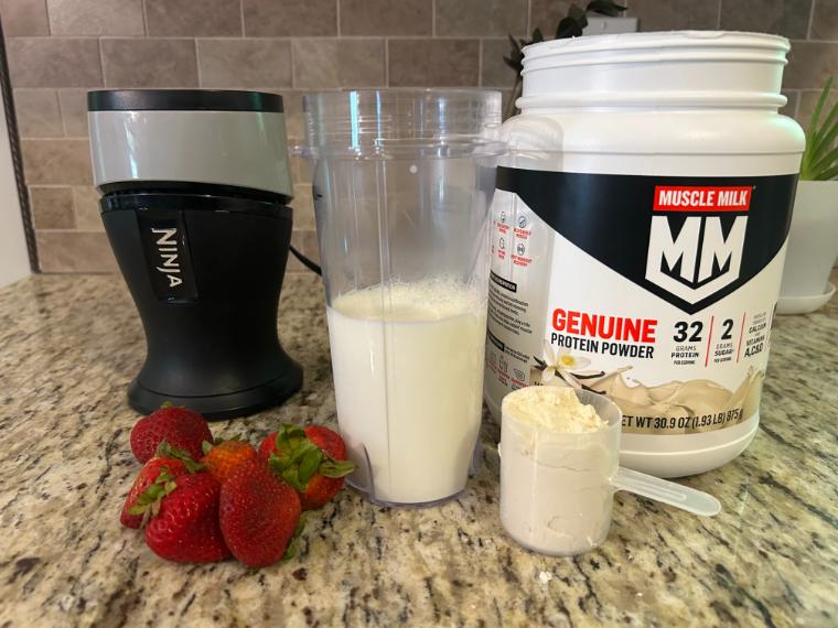 Muscle Milk Genuine Protein Powder on our tester's kitchen counter.