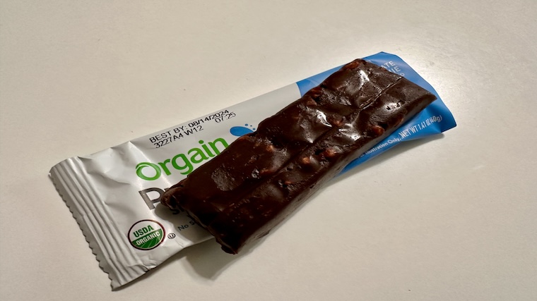 An unwrapped Orgain Protein Snack Bar