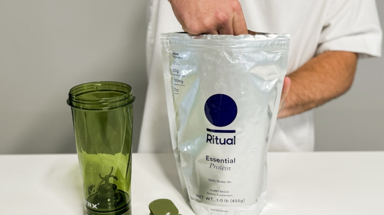 Our tester scoops up some Ritual Essential Protein Daily Shake 18 Protein Powder