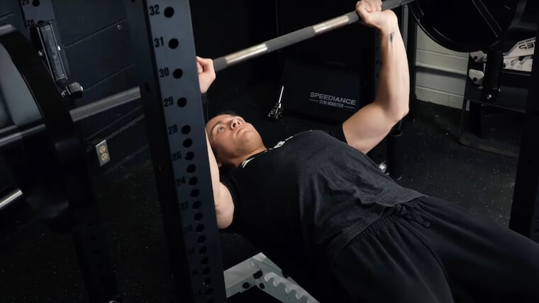 Our tester using the Bells of Steel Hydra Rack.