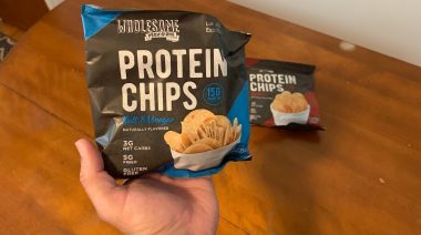 Our tester holding some of the best protein chips available