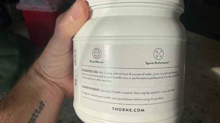 Instructions on a container of Thorne Creatine