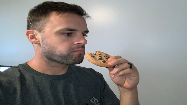 Our tester taking a bite of a Quest Cookie