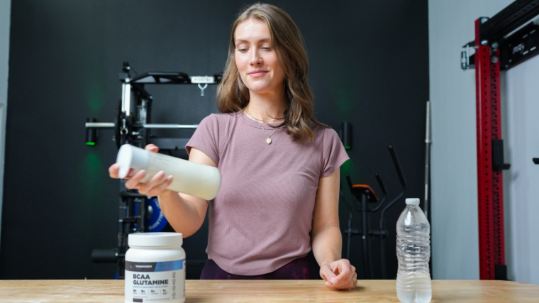 Our tester mixing a shaker of Transparent Labs BCAA Glutamine