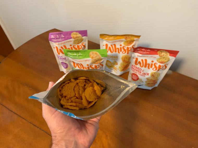 Taking a look inside a bag of Whisps Cheese Crisps.