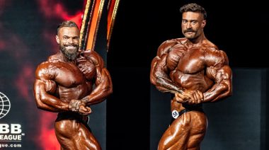 Classic Physique competitors Mike Sommerfeld and Chris Bumstead pose at the 2024 Olympia.