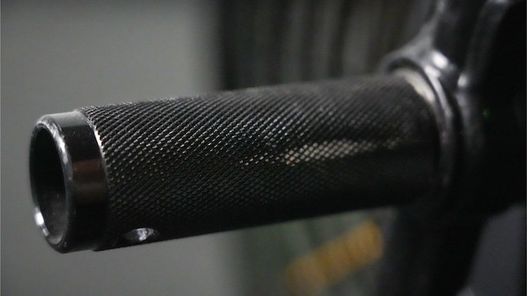 knurled foot pegs on an exercise bike