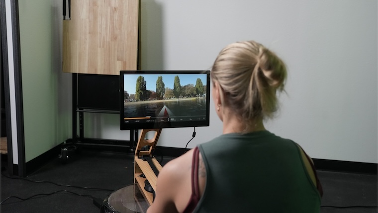 a person using the Ergatta Lite rower