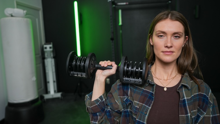 a person using FLYBIRD Adjustable Dumbbells