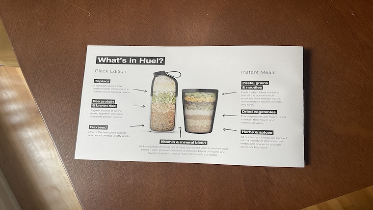 A pamphlet outlining the whole-food ingredients featured in Huel Black Edition Meal Replacement