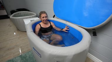 Our tester doing a plunge in the Intergize Cold Hot Tub.