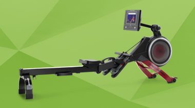 a rowing machine on a green background