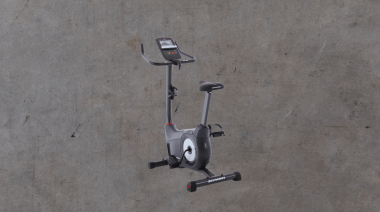 A featured image with a gray background for the Schwinn 130 Upright Bike Review