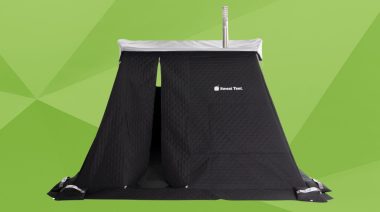 a portable at-home sauna on a green background