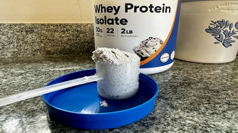 A full scoop of Nutricost Whey Protein Isolate