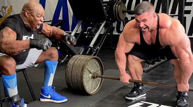 Ronnie Coleman cheers on Derek Lunsford during a deadlift.