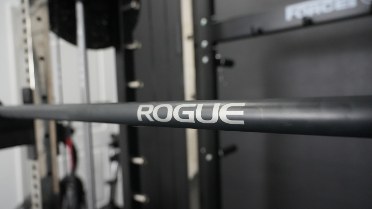 The logo on a Rogue 2.0 Barbell