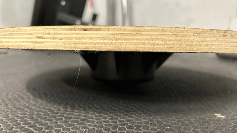 A side view of the Yes4All Wooden Wobble Balance Board.