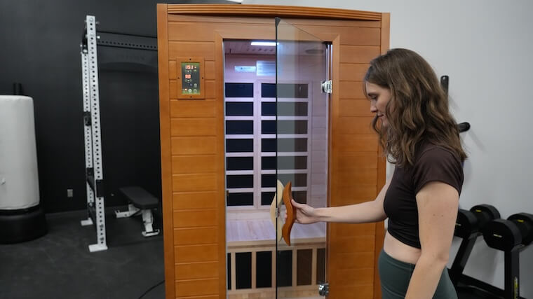 Our tester getting into the Dynamic Andora 2-Person Infrared Sauna