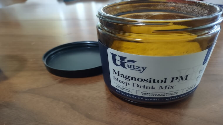 An open container of Utzy Magnositol PM