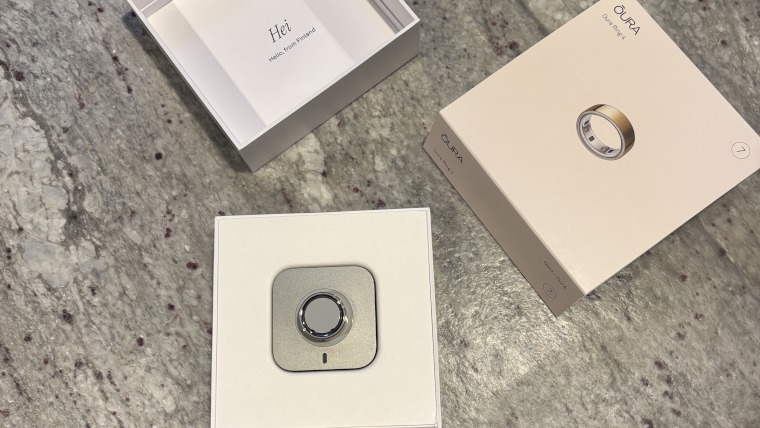 An opened box with a new Oura Ring inside