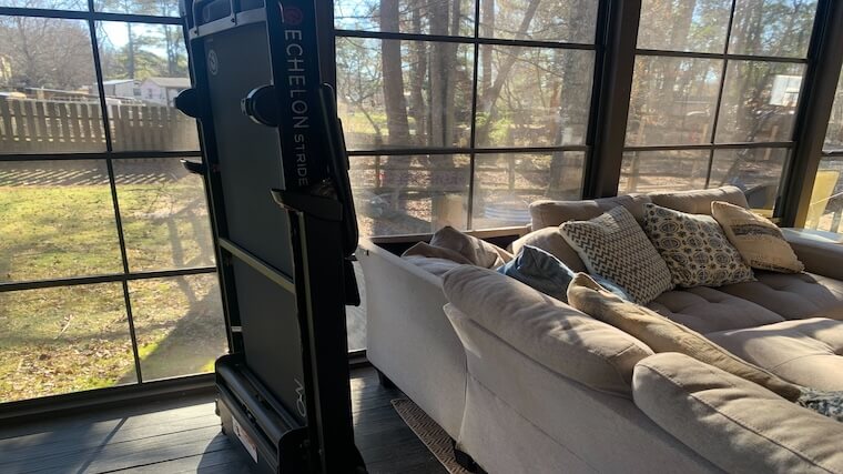 The Echelon Stride-6 treadmill folded and stored vertically at our tester's home