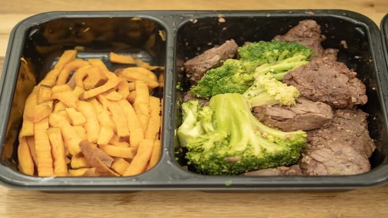 A prepared steak, broccoli, and fries dish from Factor