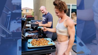 Alex Gazan helps barbeque some chicken