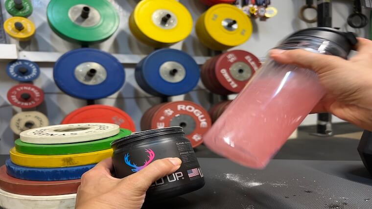 Our tester mixing a shake of Bucked Up Pre-Workout