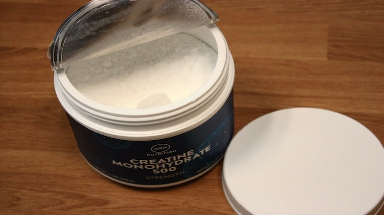 An opened container of MRM Nutrition Creatine Monohydrate