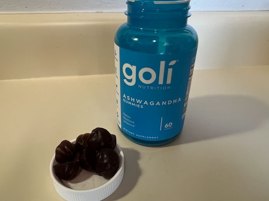 Goli Ashwagandha gummies sitting in bottle cap
