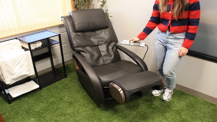Our tester dialing in their settings with the Human Touch WholeBody 8.0 prior to a massage session