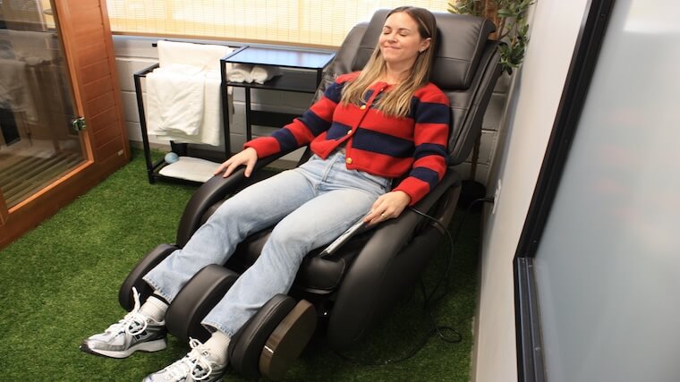 Our tester taking in a session with the The Human Touch WholeBody 8.0