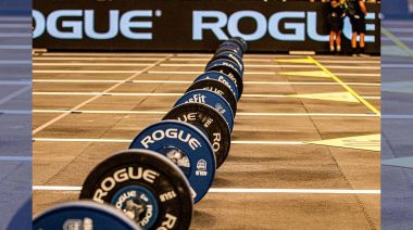A row of barbells staged for a competition