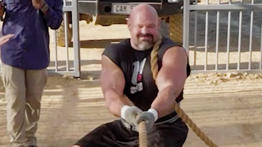 Brian Shaw Battles a Lion in a Tug-of-War