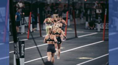 Women run during a CrossFit Games competition
