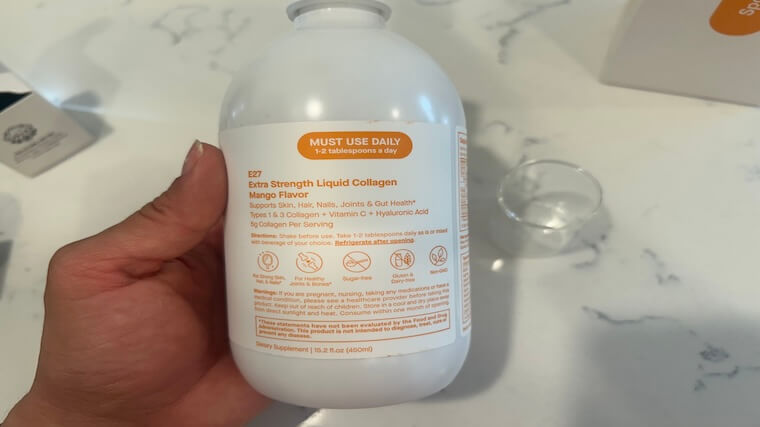 Our tester reading the label of Spoiled Child Liquid Collagen