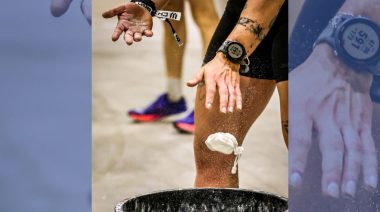 An athlete is shown wearing a smart watch